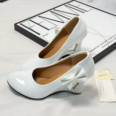 Pegged bow leather shoes PinTow