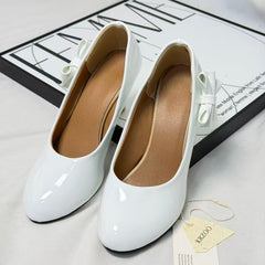 Pegged bow leather shoes PinTow