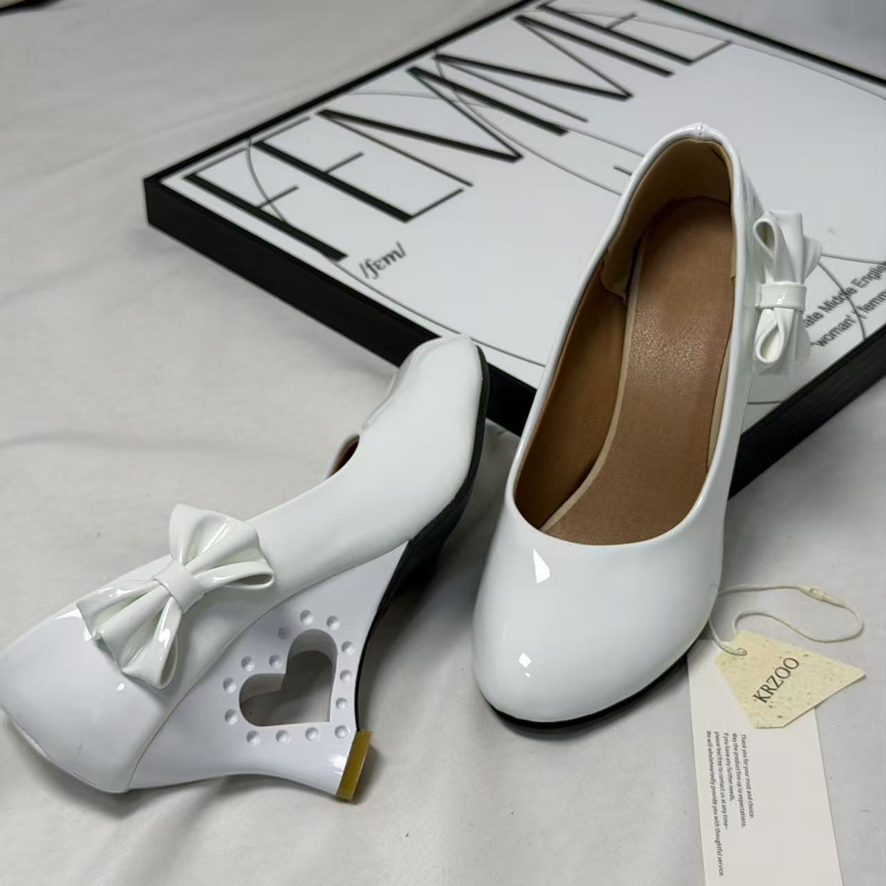Pegged bow leather shoes PinTow