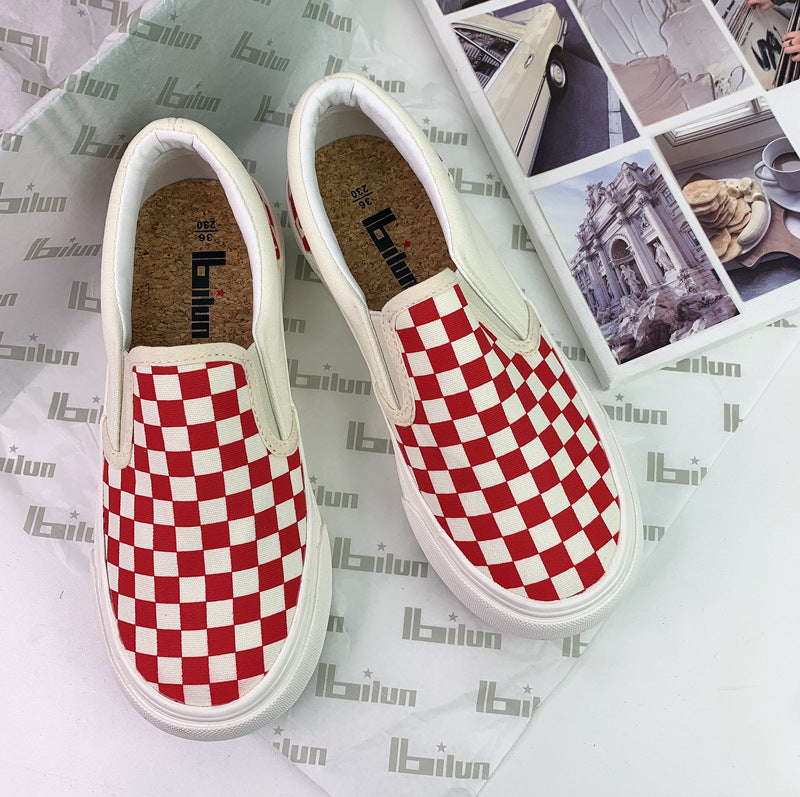 Women's Black And White Chessboard Plaid Slip-on Canvas Shoes Newgew