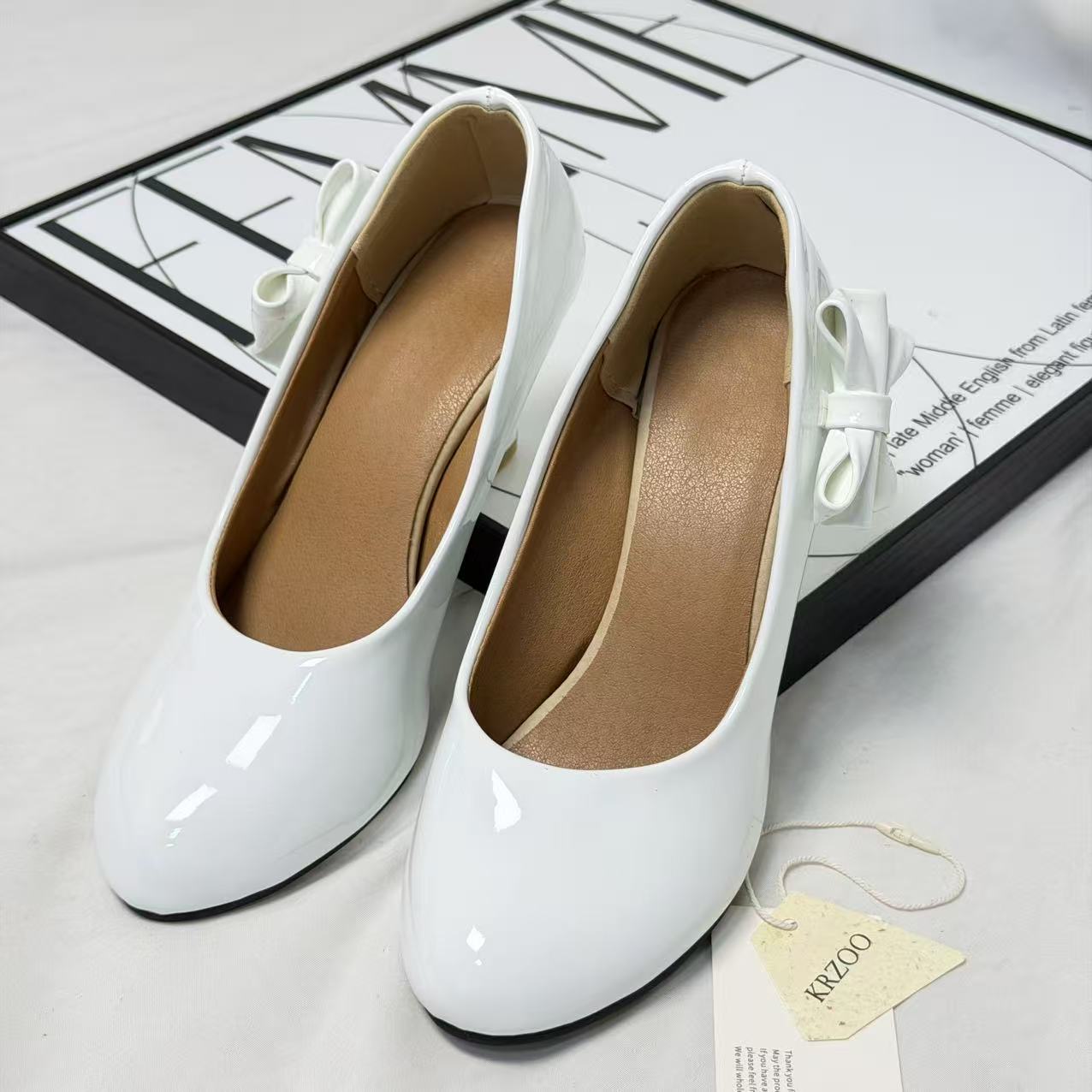 Pegged bow leather shoes PinTow