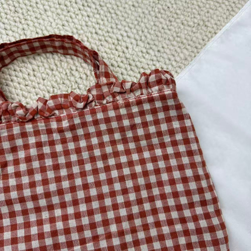 Small Red Handbag With A Checkered Pattern PinTow