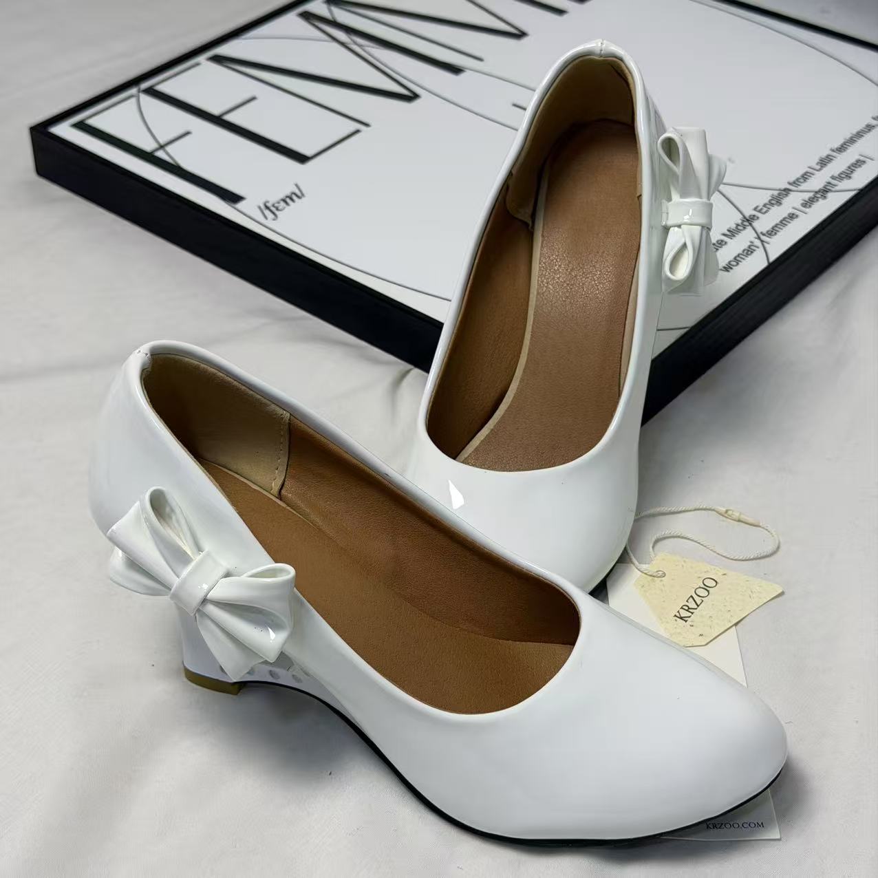 Pegged bow leather shoes PinTow