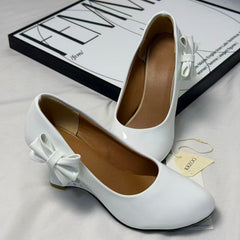Pegged bow leather shoes PinTow
